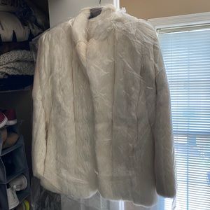 Real silk lined rabbit fur coat